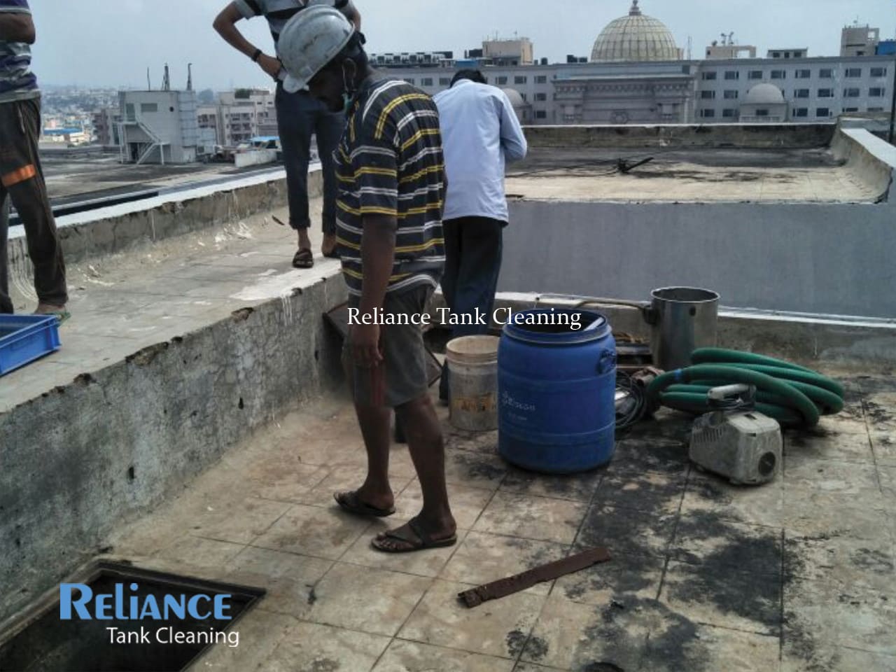 overhead cement tank cleaning